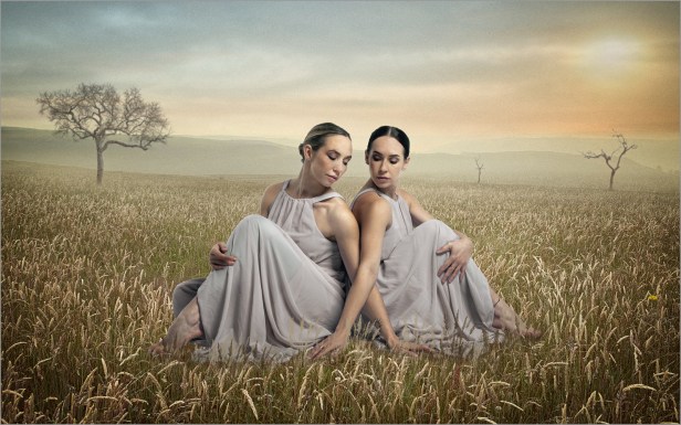 2 girls in a surreal warm toned landscape